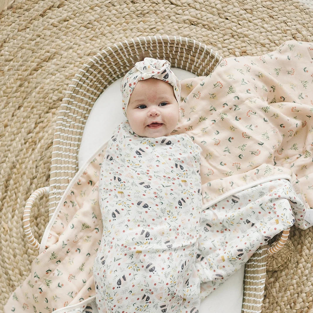 Loulou Lollipop Baby Muslin Quilt in Tanboocel® Bamboo Viscose - Bumble Bees — quilt blanket shown in a nursery setting.