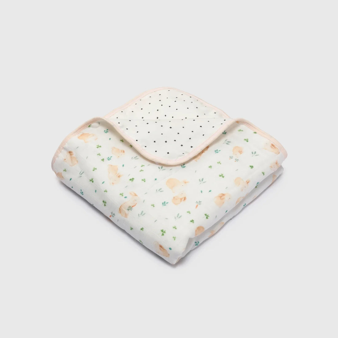 Loulou Lollipop Baby Muslin Quilt in Tanboocel® Bamboo Viscose - Bunny Meadow — folded quilt showing the printed front and reverse.