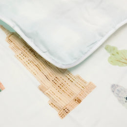 Loulou Lollipop Quilt Blanket in Muslin
