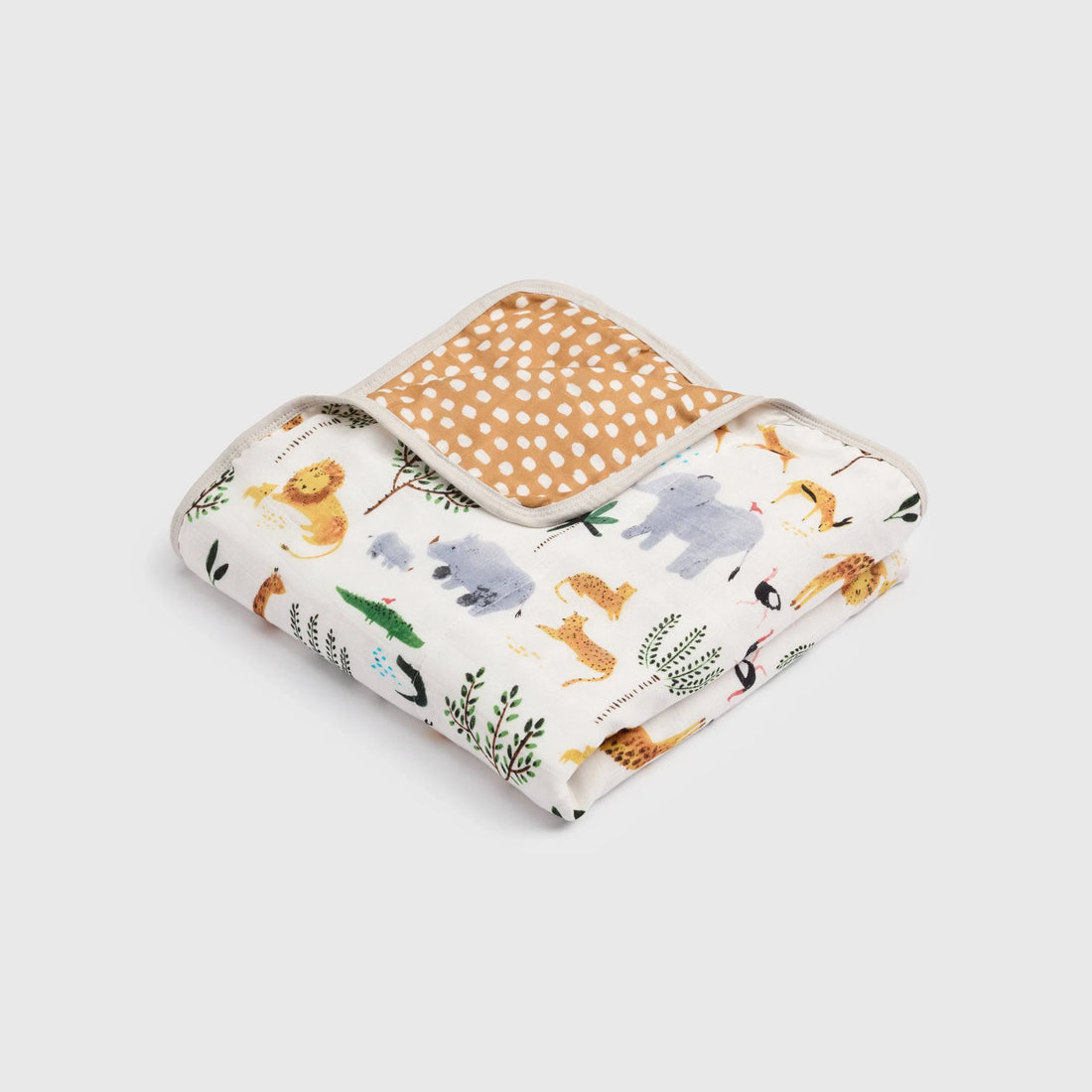 Loulou Lollipop Baby Muslin Quilt in Tanboocel® Bamboo Viscose - Safari Jungle — folded quilt showing the printed front and reverse.