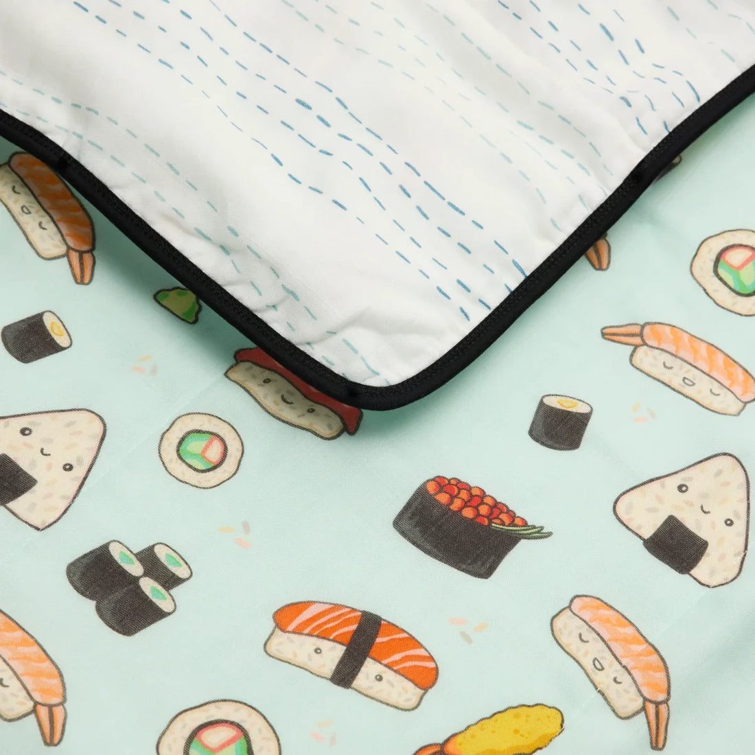 Loulou Lollipop Baby Muslin Quilt in Tanboocel® Bamboo Viscose - Sushi — close-up of fabric, print and construction.