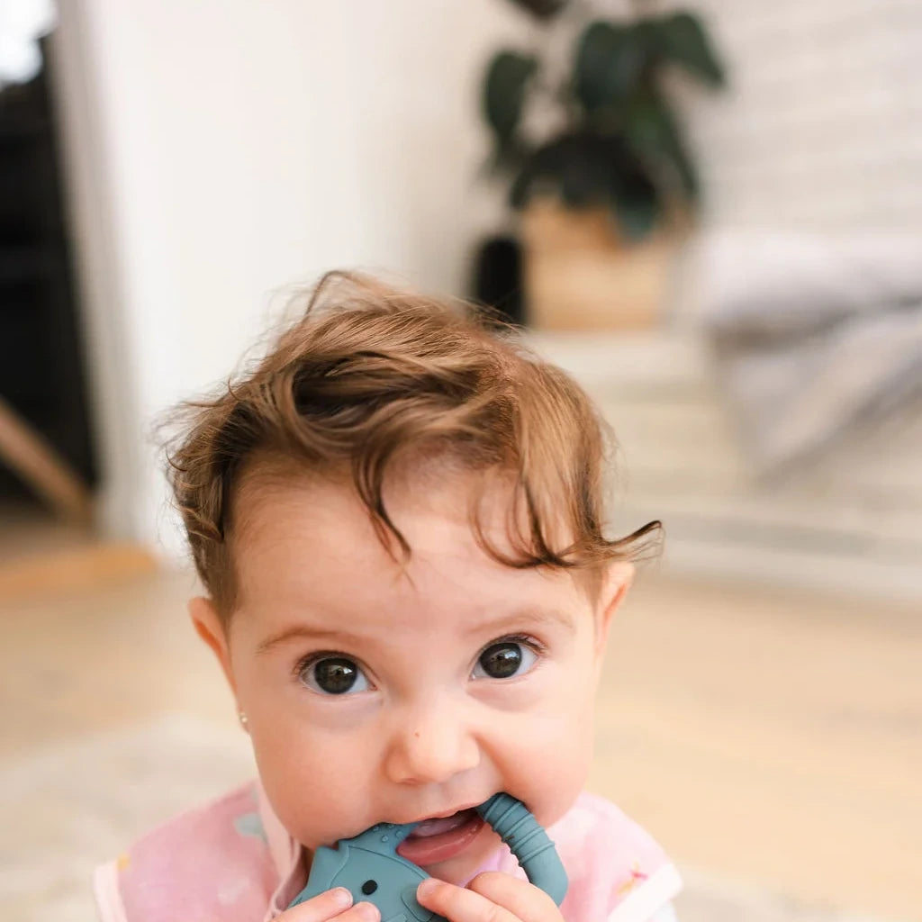 Loulou Lollipop Baby Muslin Sleep Bag 0.5 TOG in Tanboocel® Bamboo Viscose - Dancing Dragonflies — baby wearing the sleep bag at home.