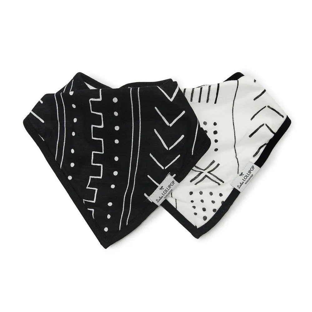 Loulou Lollipop Bandana Bib Set: black and white geometric prints, 2-pack, laid flat for mealtime.