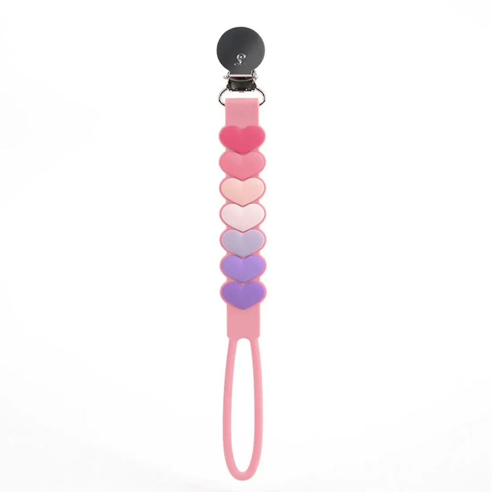 Loulou Lollipop Beadless Pacifier Clip in pink gradient heart beads, attached to a pink strap with clip end.
