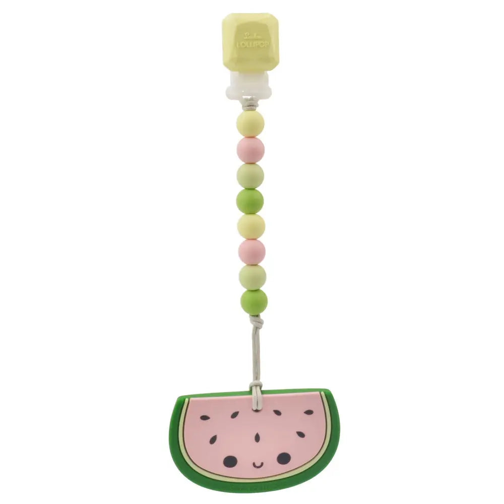 Loulou Lollipop Gem Pacifier Clip Teether Set with pastel bead chain and watermelon pendant clipped to a pacifier.
