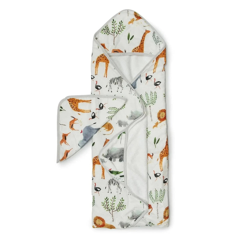 Loulou Lollipop Hooded Towel Set, white safari print with giraffes and elephants, hooded towel folded to show soft terry lining.