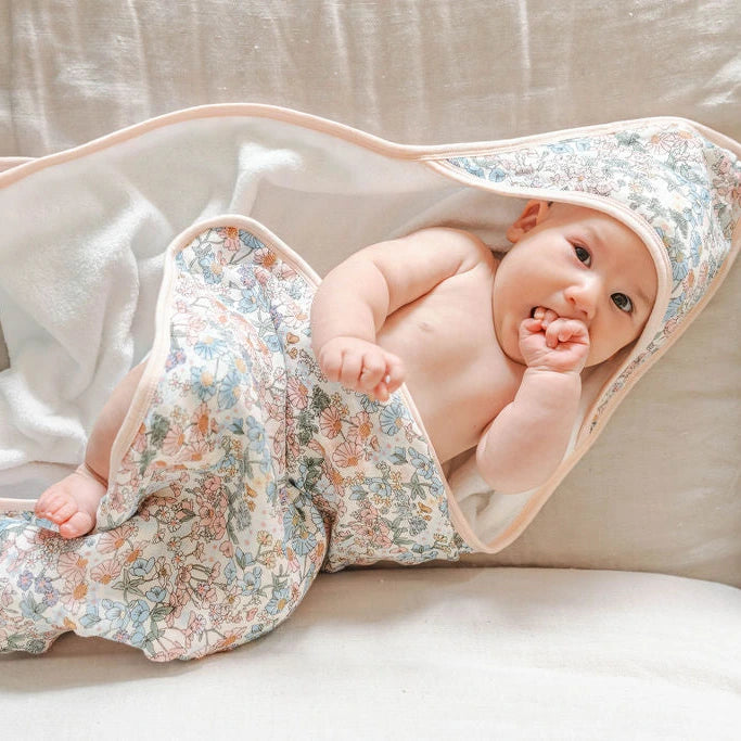 Loulou Lollipop Hooded Towel Set - English Garden — hooded towel shown during baby bath time.