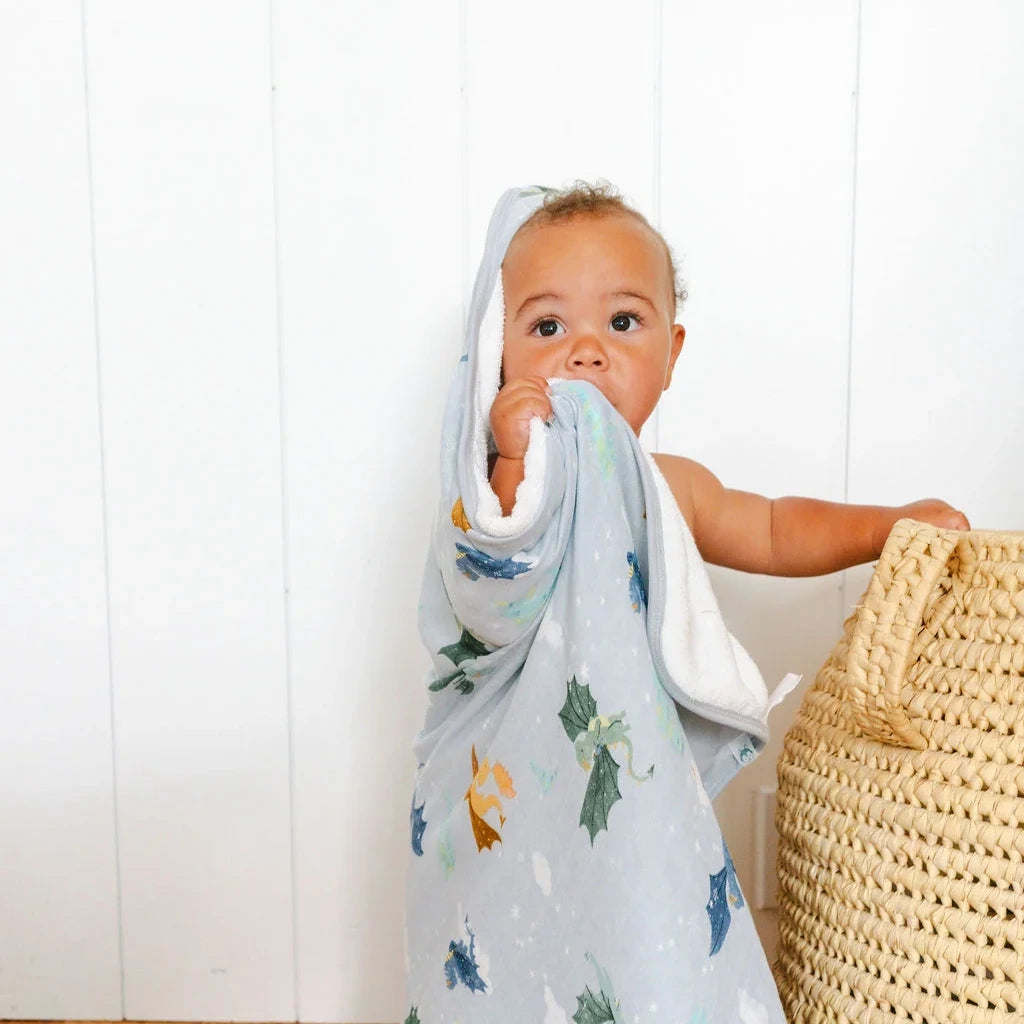 Loulou Lollipop Hooded Towel Set - Magical Dragons — hooded towel shown during baby bath time.