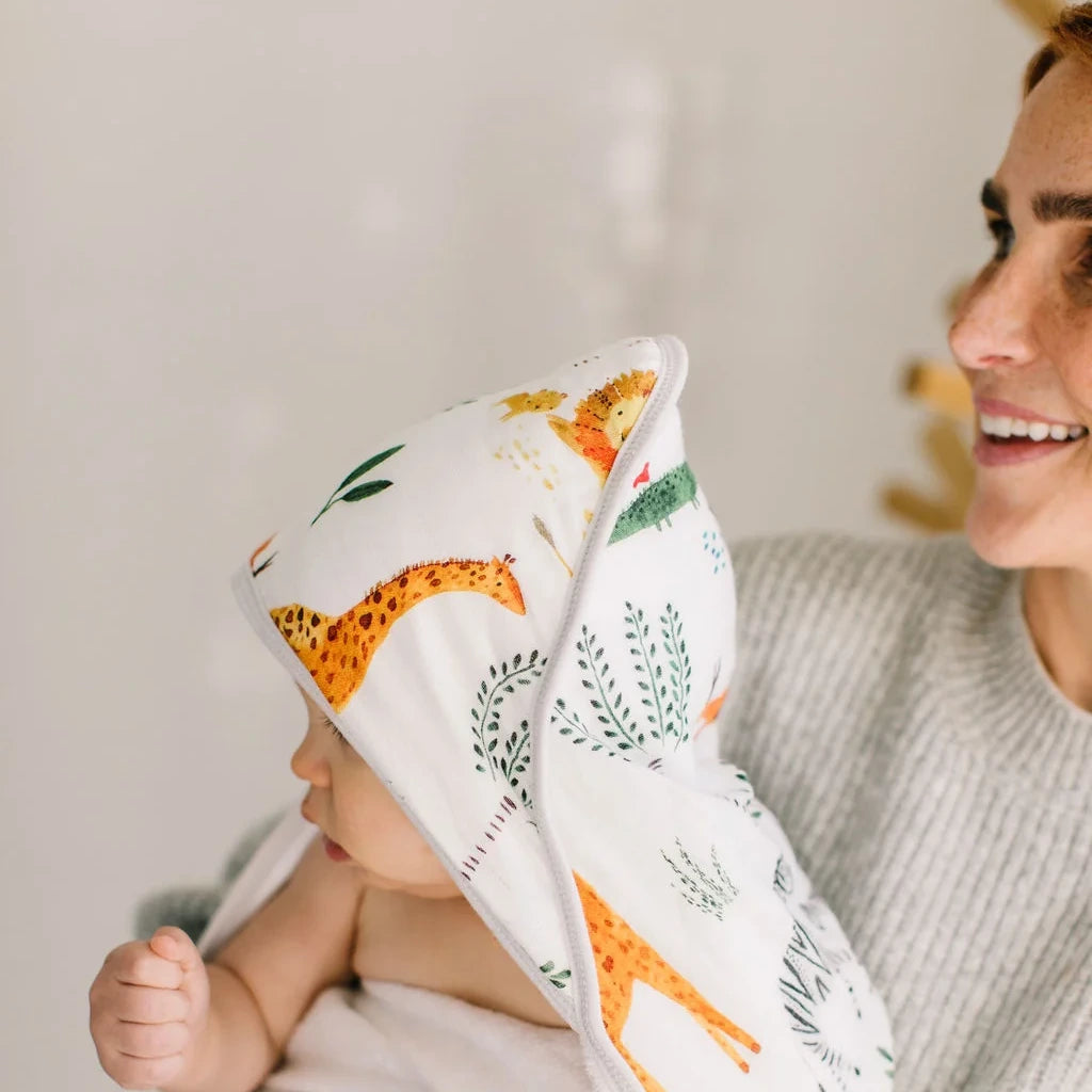 Loulou Lollipop Hooded Towel Set - Safari Jungle — hooded towel shown during baby bath time.