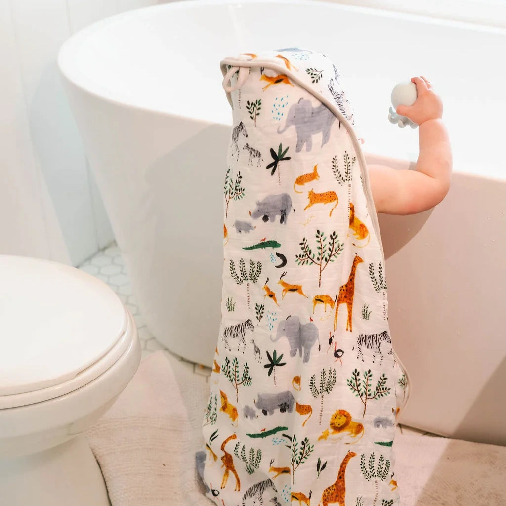 Loulou Lollipop Hooded Towel Set - Safari Jungle — hooded towel shown during baby bath time.