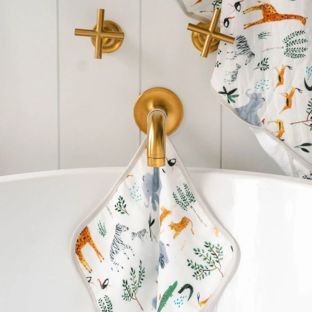 Loulou Lollipop Hooded Towel Set - Safari Jungle — hooded towel shown during baby bath time.