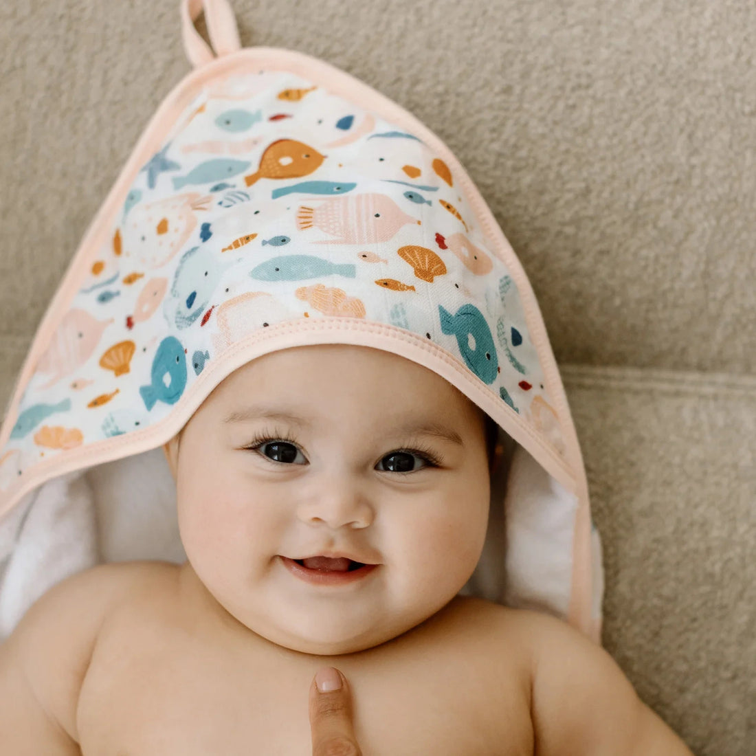 Loulou Lollipop Hooded Towel Set - Sun Kissed Shoal — hooded towel shown during baby bath time.