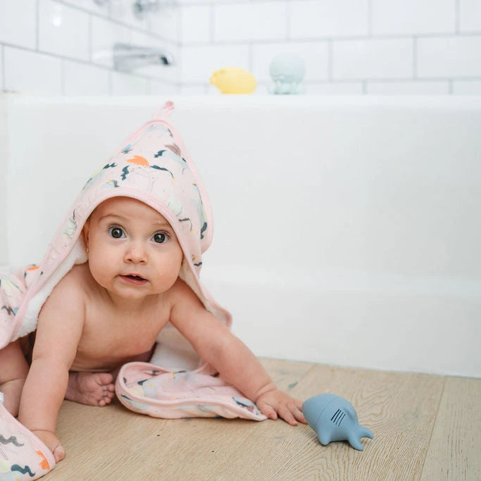 Loulou Lollipop Hooded Towel Set - Unicorn Ballet — hooded towel shown during baby bath time.
