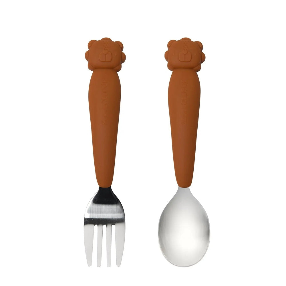 Loulou Lollipop kids spoon and fork set in orange handles with lion head toppers, stainless steel utensils.