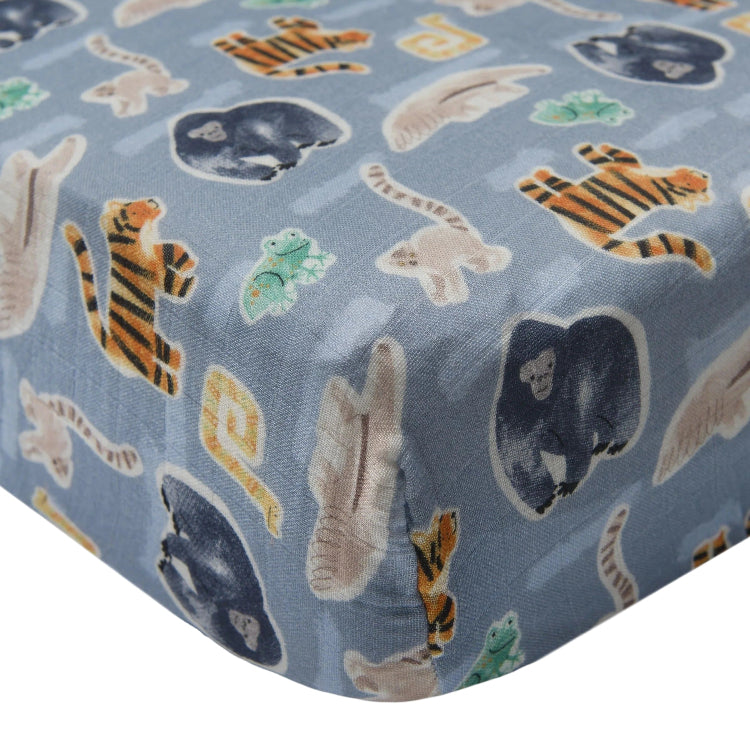 Loulou Lollipop muslin fitted crib sheet Jungle Friends blue with tiger and elephant motifs