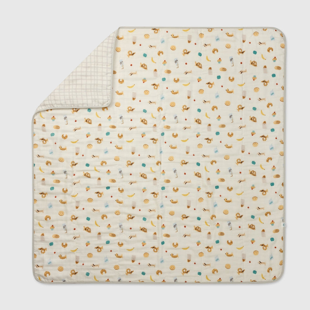 Loulou Lollipop muslin baby quilt blanket in French Breakfast — front view on white background