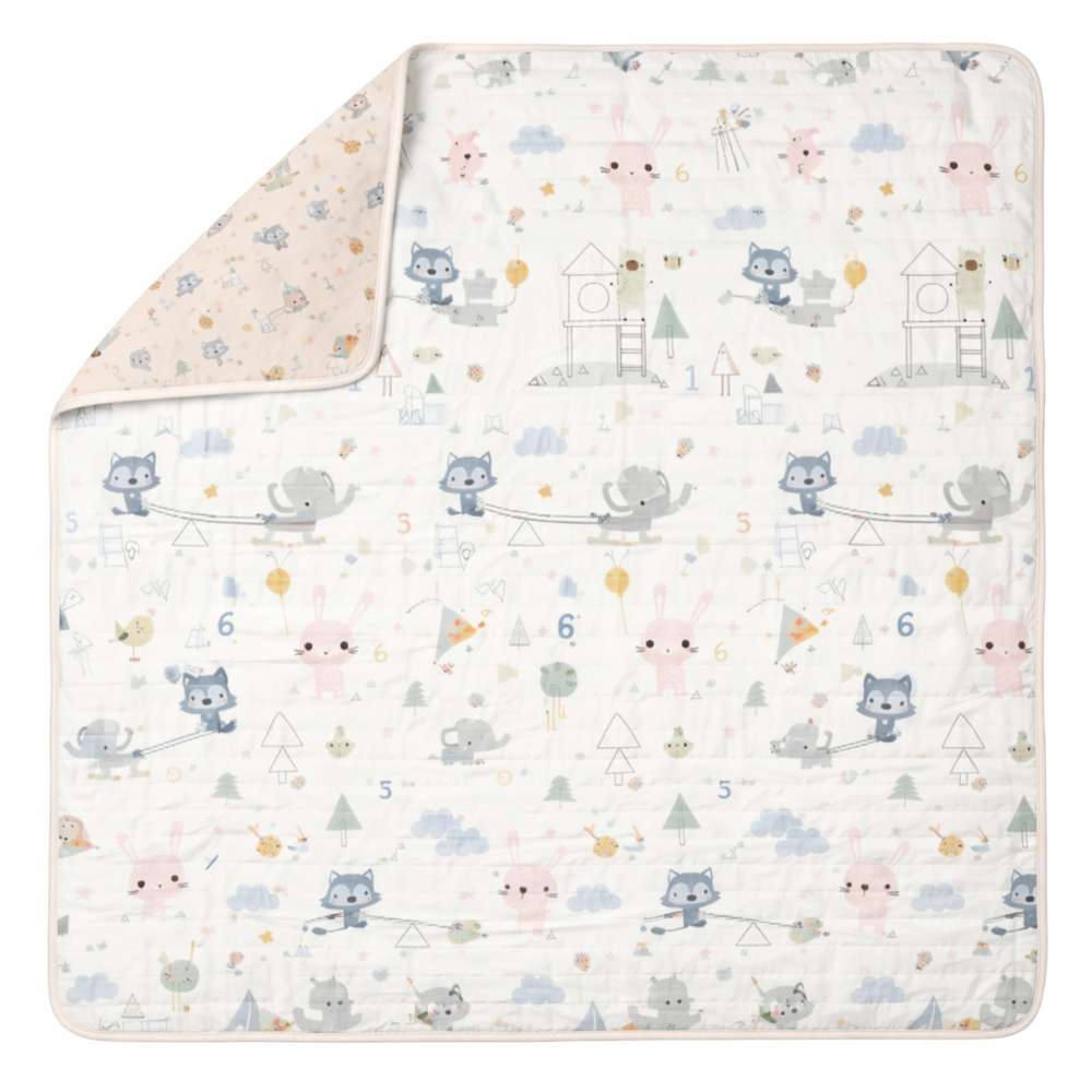 Loulou Lollipop Muslin Quilt Blanket in Pastel Animal Print with Peach Backing