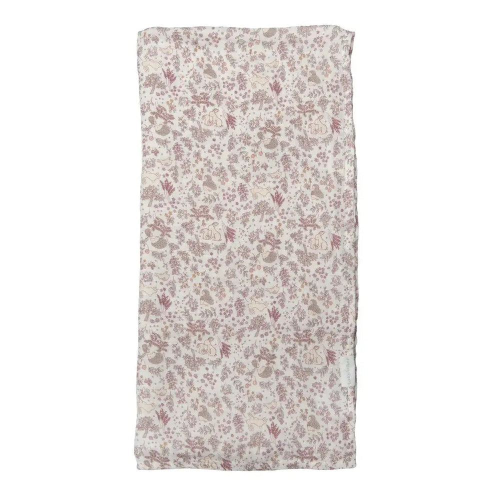 Loulou Lollipop Muslin Swaddle laid flat in pink floral print, showcasing soft breathable cotton fabric.