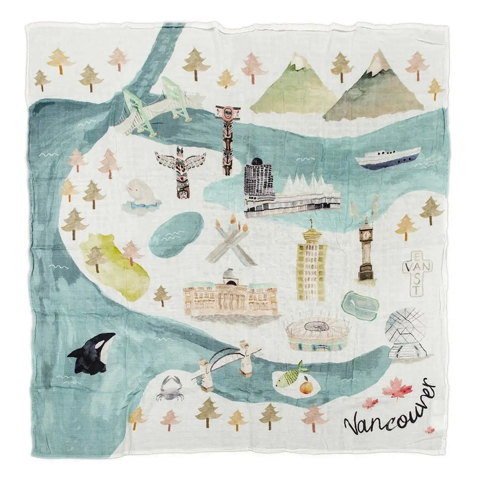 Loulou Lollipop Muslin Swaddle with Vancouver city map in soft blues and greens, laid flat to show fabric texture.