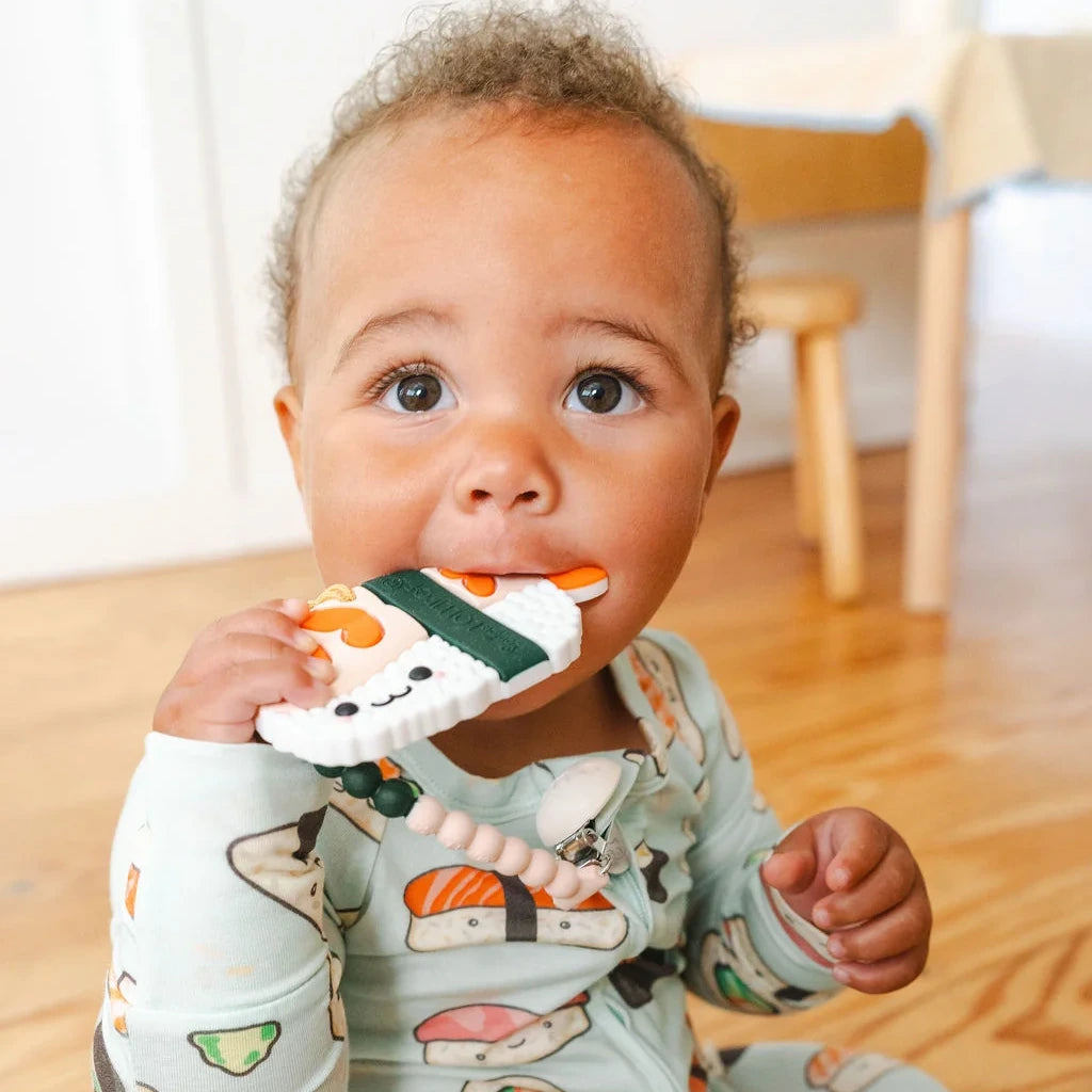 Loulou Lollipop OneC™ Silicone Clip Teether Set - Ebi Shrimp — baby holding or using the silicone teether.