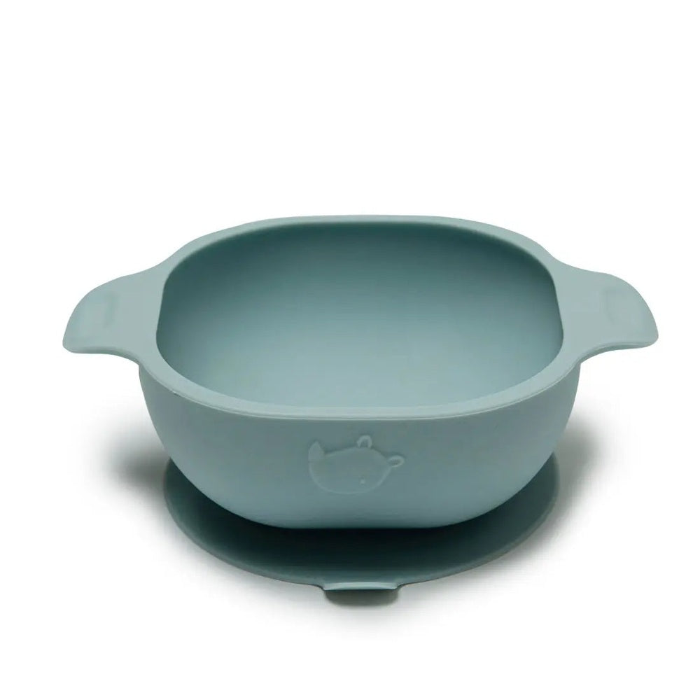 Loulou Lollipop Silicone Snack Bowl in pale blue with integrated side handles, ready for baby mealtime.