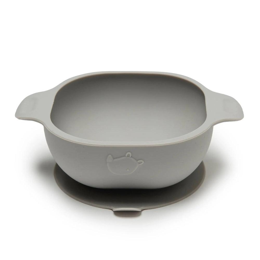 Loulou Lollipop Silicone Snack Bowl in grey with bear embossing and side handles on a matching coaster.