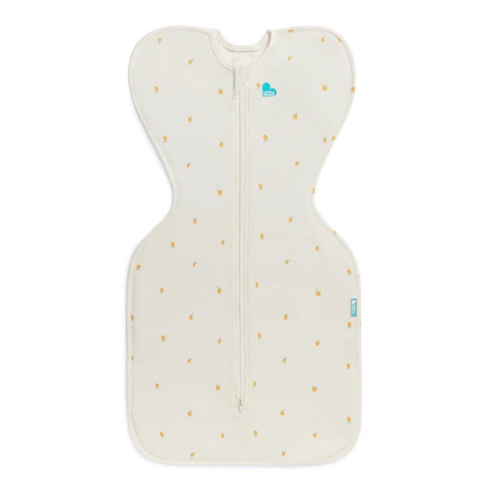 LOVE TO DREAM Love To Dream Swaddle Up Bamboo 1.0 Tog Cream Lemons Arms-up wing design with full-length center zipper img 1/8