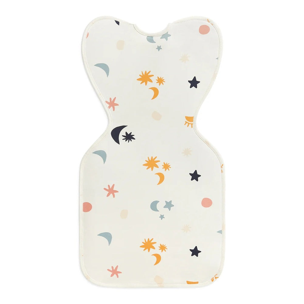 LOVE TO DREAM Love To Dream Swaddle Up Organic Cotton 1.0 Tog Buff Lunar hourglass silhouette with celestial moons, stars, and suns img 3/7