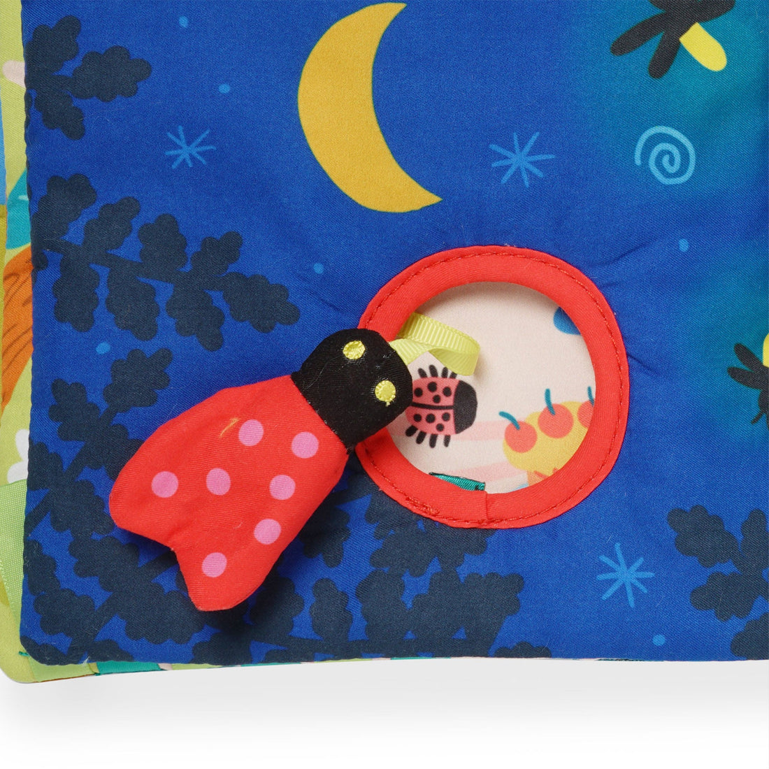 Manhattan Toy Bugging Through Sensory Book - close-up of crinkle bug passing through round cut-out