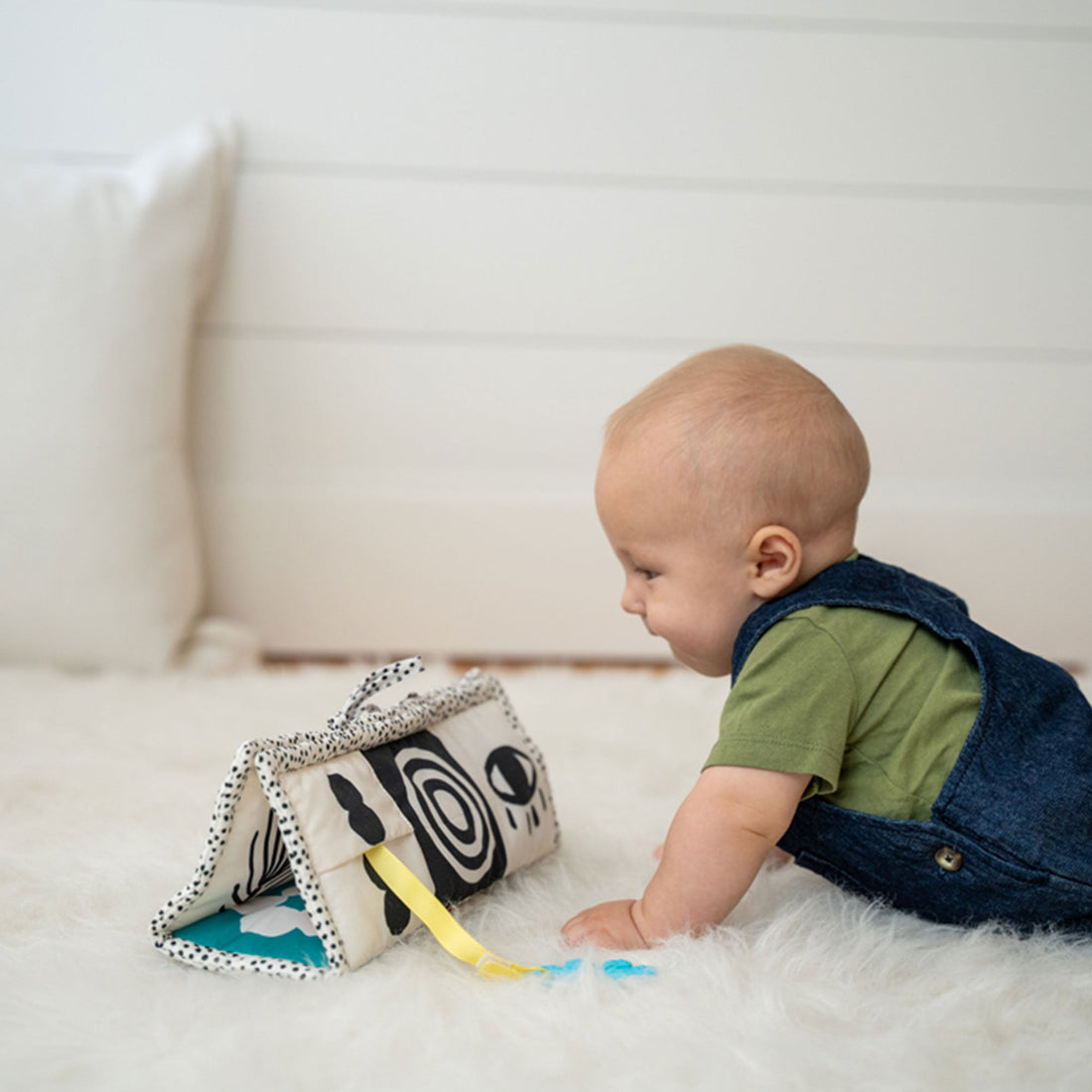 Manhattan Toy Wimmer 3-in-1 Play Mat - baby crawling toward the triangular play mode