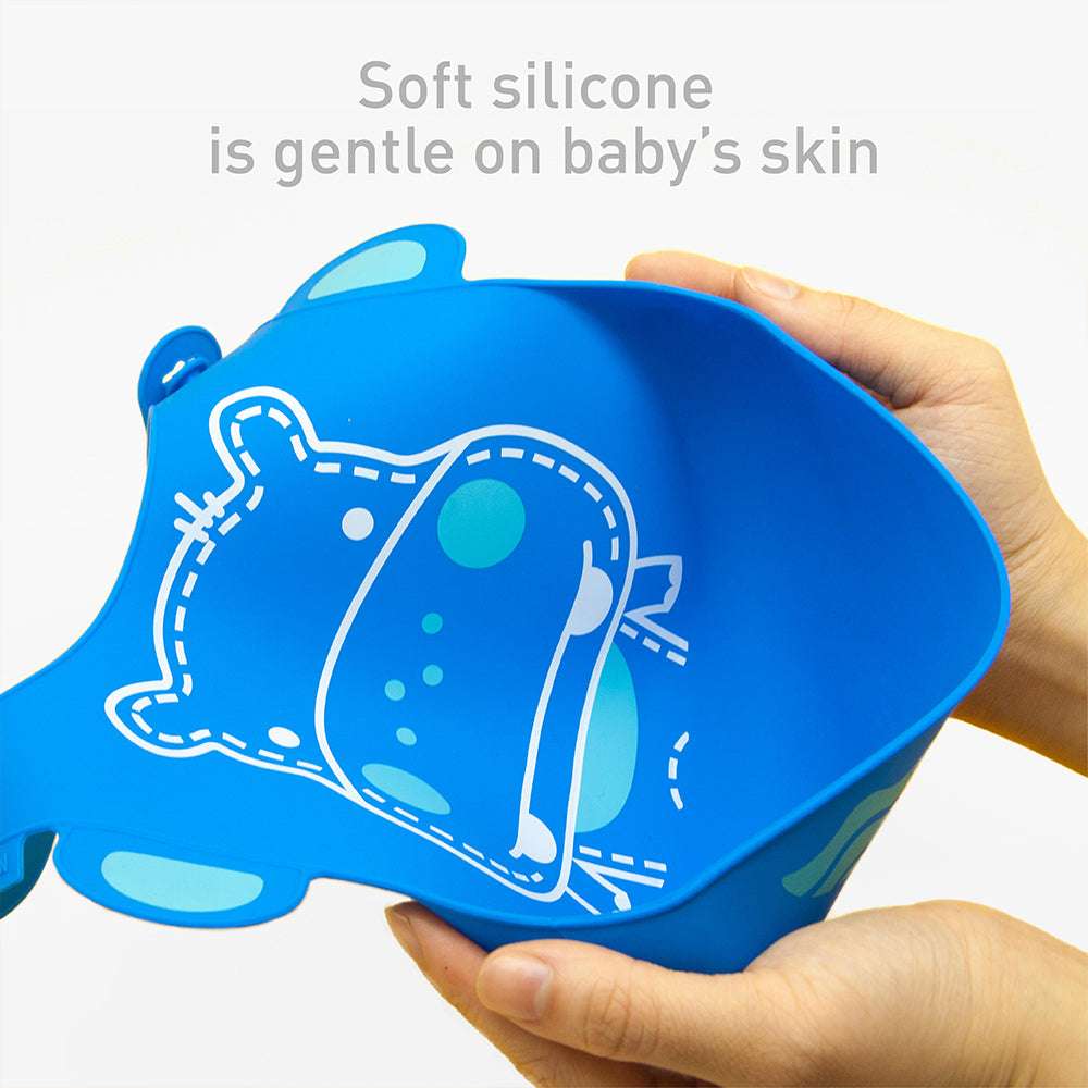 Marcus & Marcus baby bib in blue silicone with a spill-catching pocket for mealtime