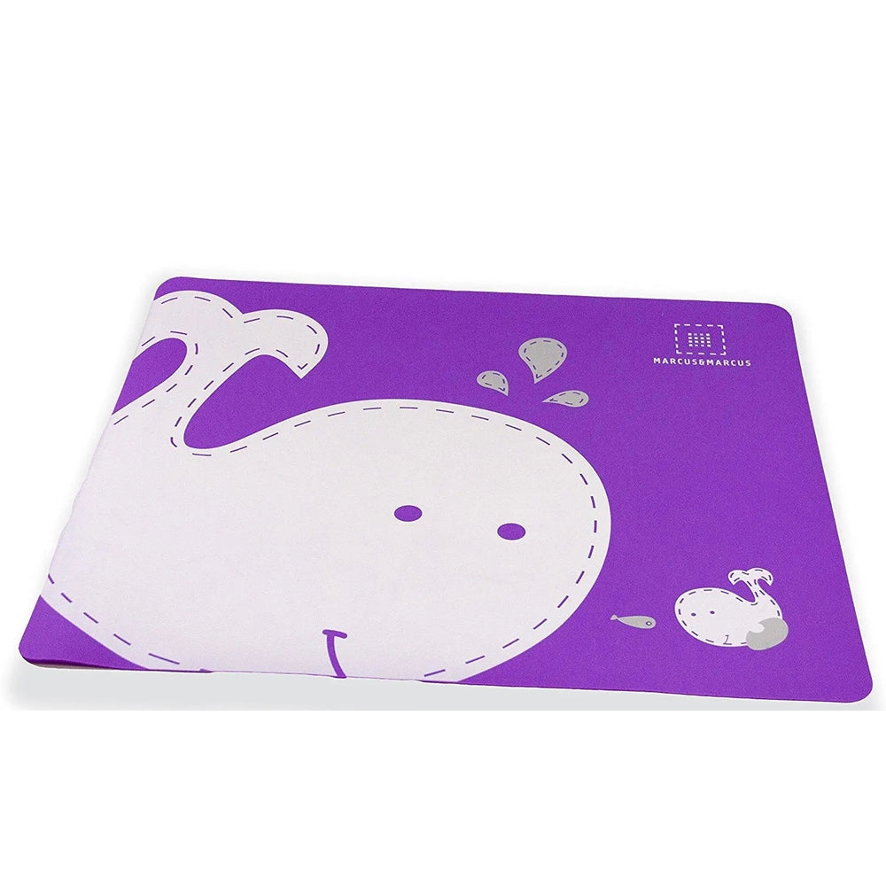 Marcus & Marcus Baby Placemat, purple with white stitched whale graphic; brand logo visible.