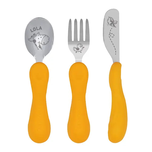 Marcus & Marcus Easy Grip Cutlery Set with orange handles; spoon, fork, and knife laid out for easy grip.