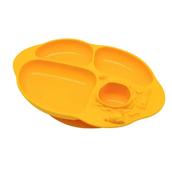 Marcus & Marcus Yummy Dips Suction Divided Plate in bright yellow silicone, featuring three compartments and a suction base secured to the table.