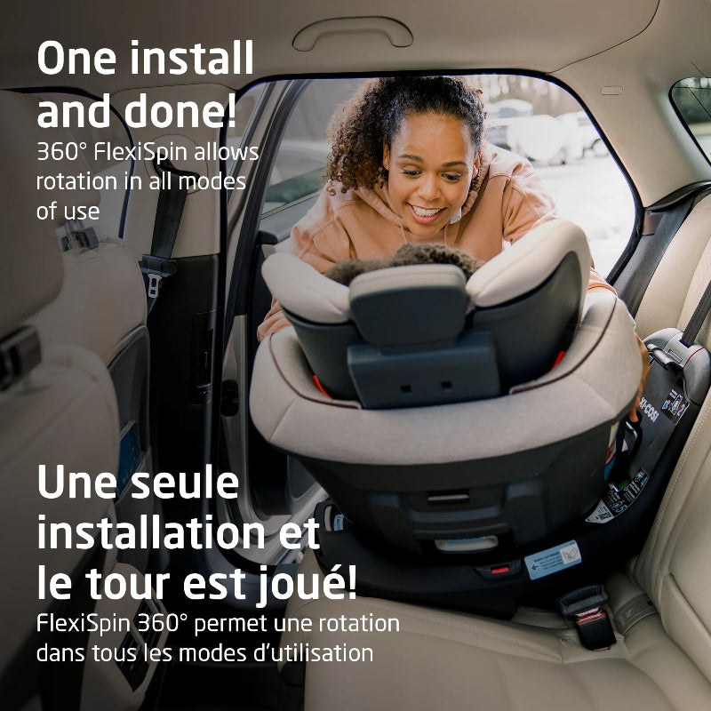 MAXI COSI Andi 360 rotating convertible car seat in beige/gray installed in car with parent and infant