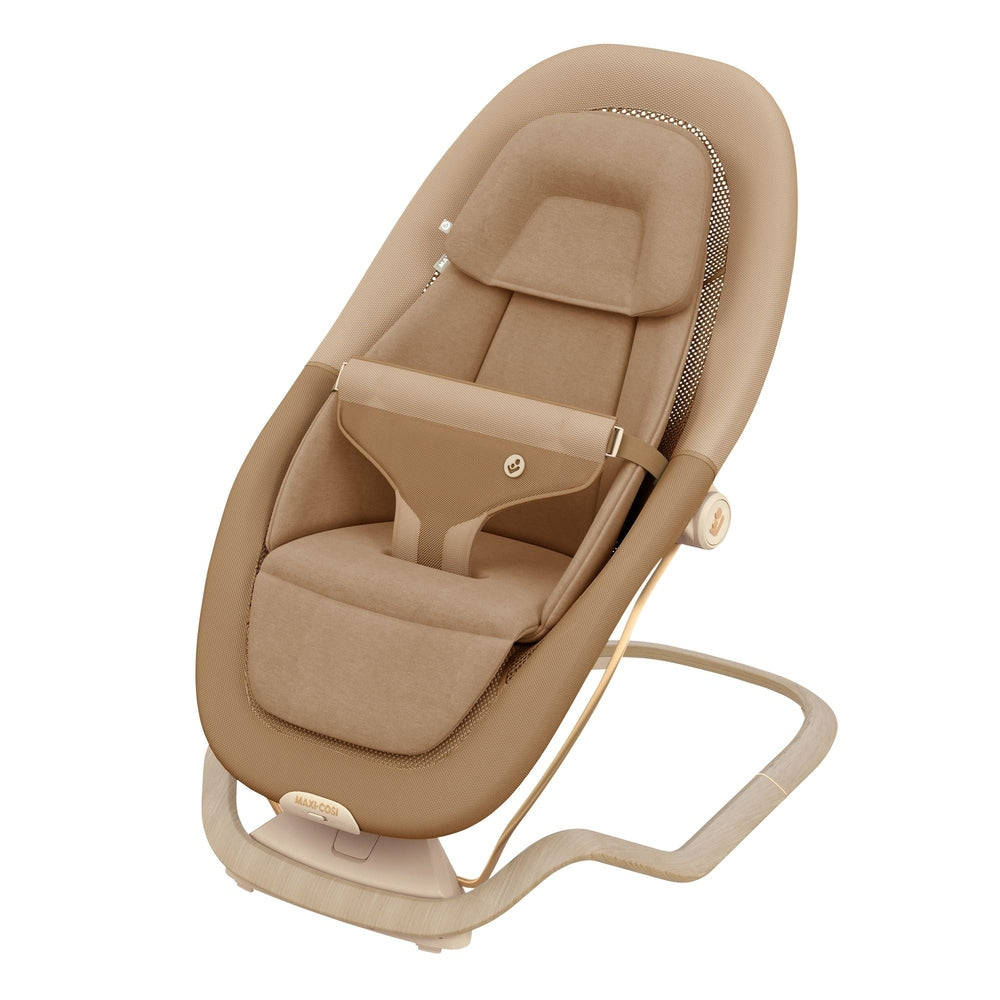 Tan baby bouncer with padded insert and wood-look rocking base