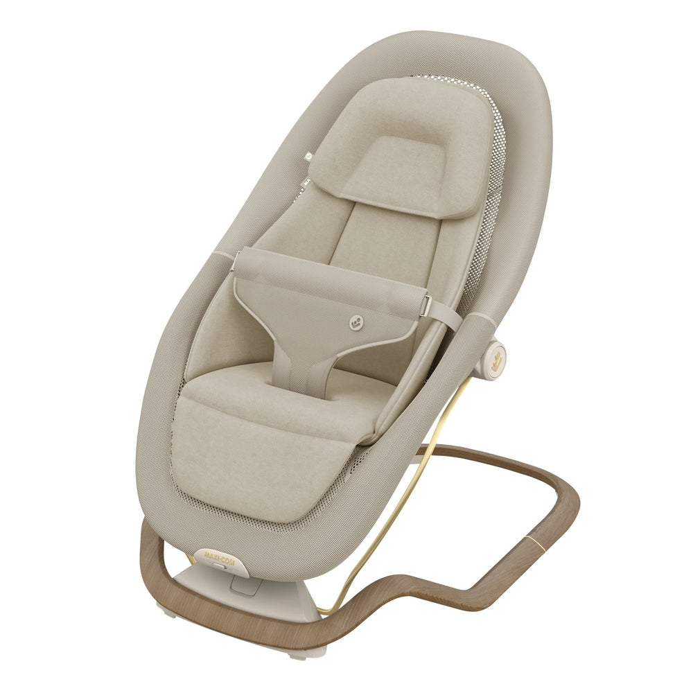 Beige baby bouncer with padded newborn insert and wood-look base