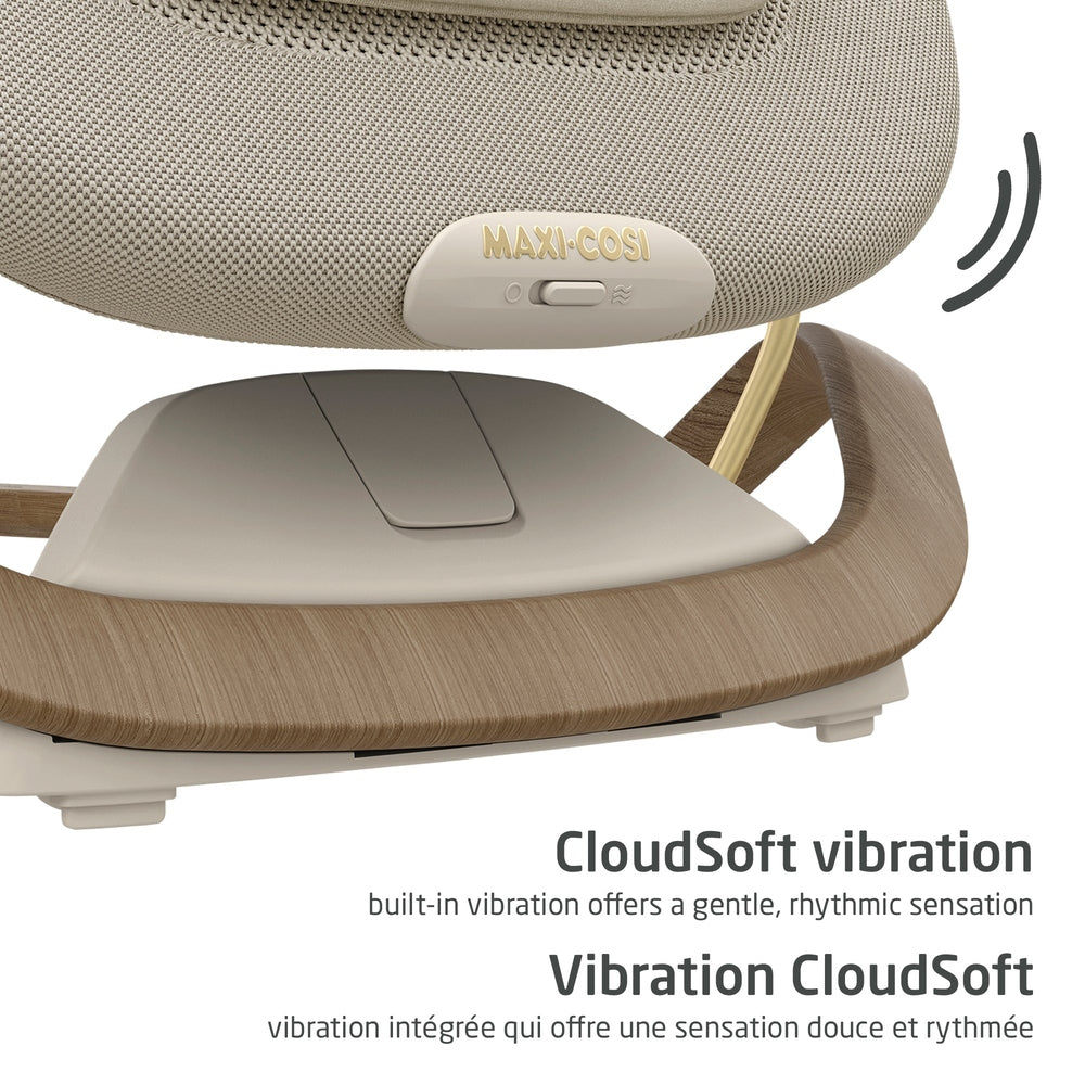 Beige baby bouncer close-up with vibration switch and wood-look frame