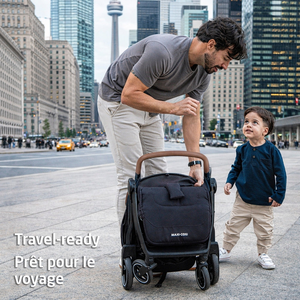 MAXI COSI Maxi Cosi Eva3 Lightweight Compact Travel Stroller stroller shown from image 2 of 8 with visible canopy, handlebar and wheel setup