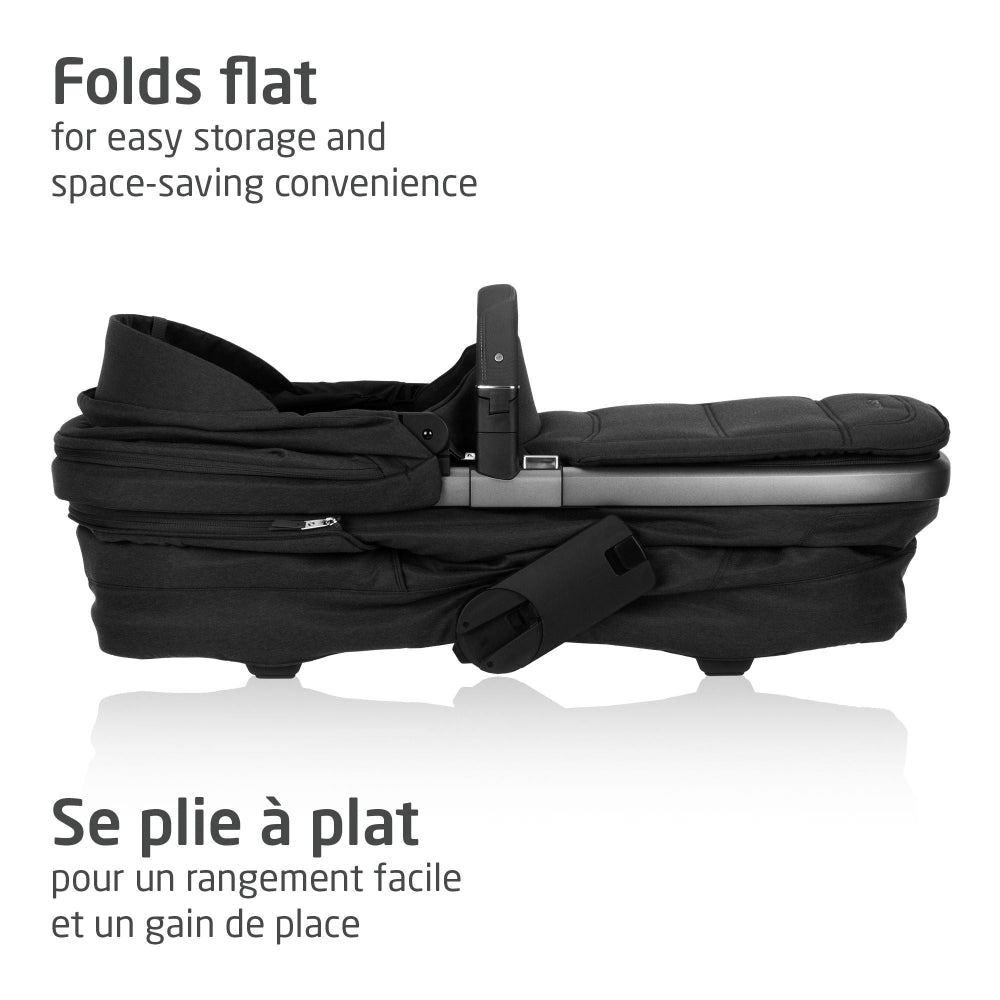 Maxi-Cosi Fame Carry Cot folded flat in black fabric for easy storage and space saving