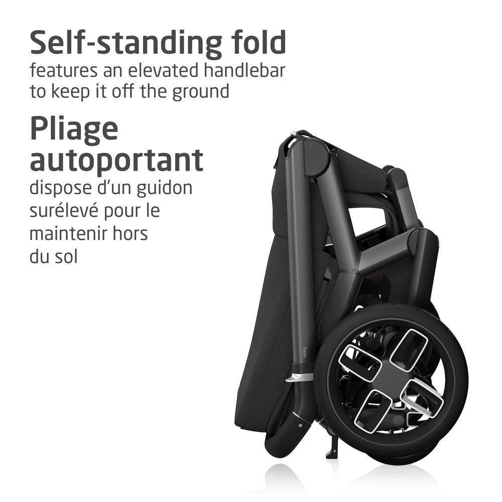 Black folded stroller with self-standing fold, metal frame and large multi-spoke alloy wheels.
