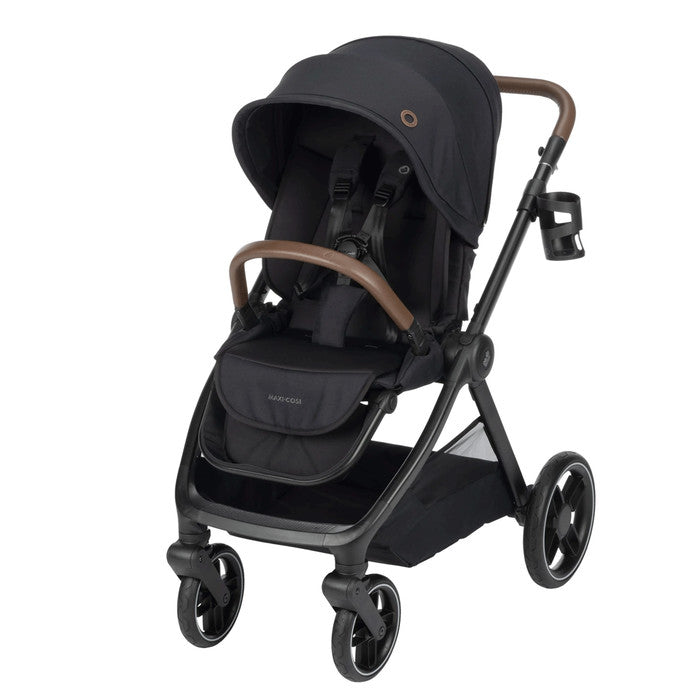Maxi-Cosi Oxford Stroller in black with brown faux-leather handlebar and 4 wheels