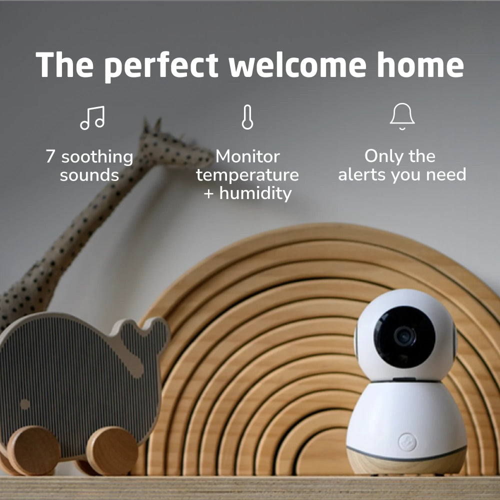 MAXI COSI See Pro 360 baby monitor, white spherical camera on wooden stand in a nursery