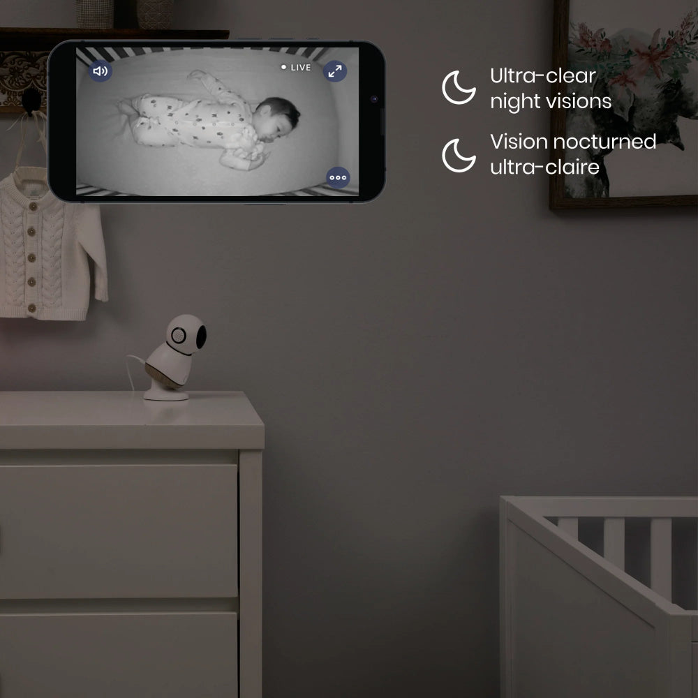 MAXI COSI See Pro 360 baby monitor with infrared night vision on a dresser in a nursery