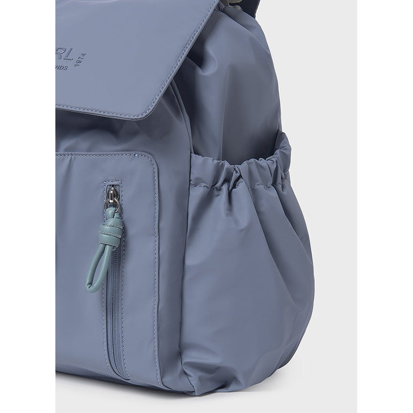 Gray backpack with a drawstring and zipper on a light gray background