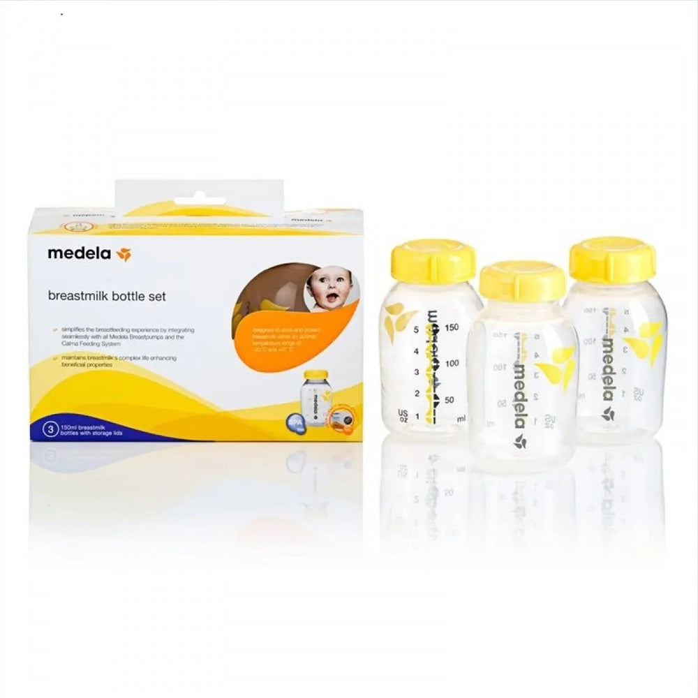 Medela Breastmilk Bottle Set-three clear bottles with yellow caps beside the MEDELA box featuring a baby image.