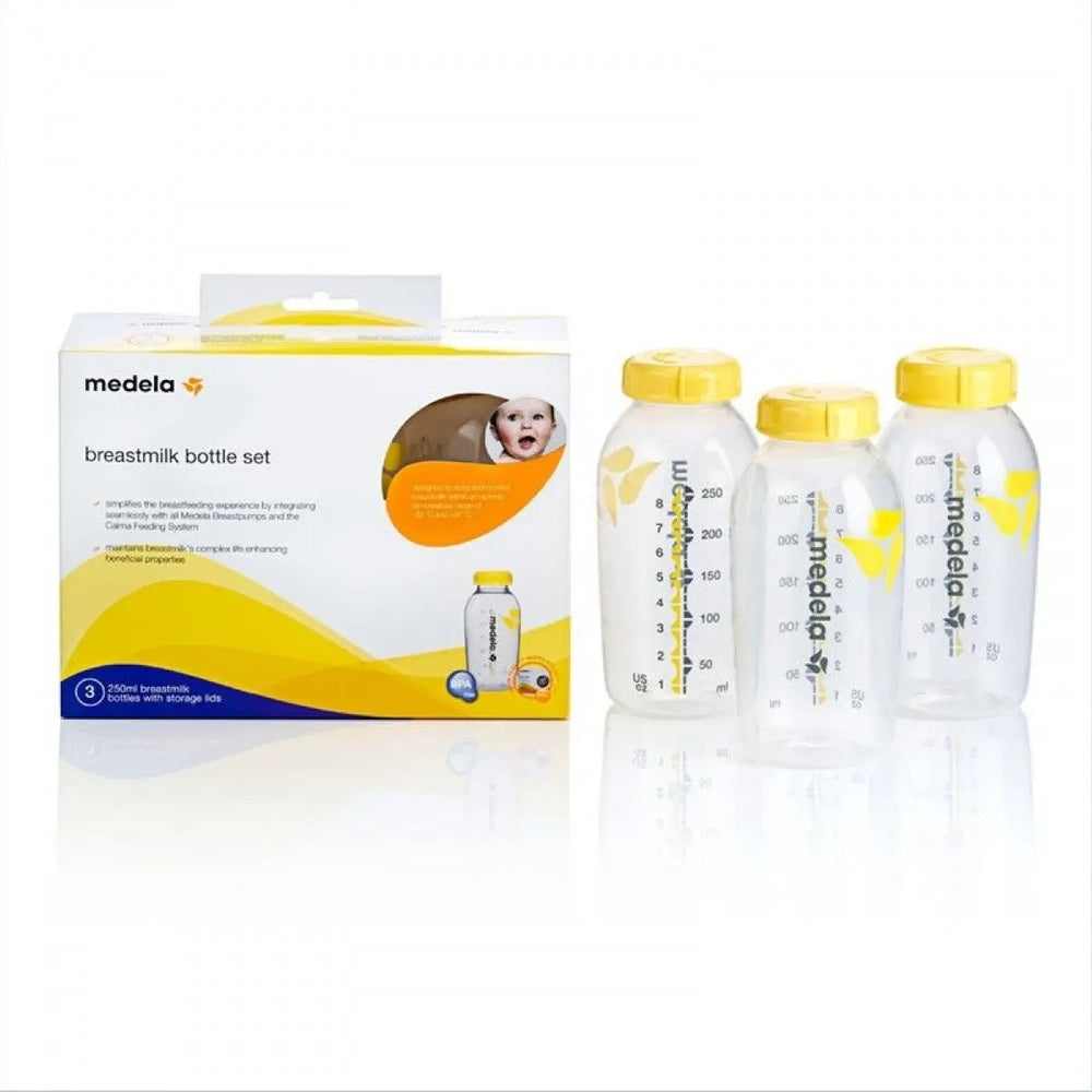 Medela Breastmilk Bottle set, three clear bottles with yellow caps shown beside their box.