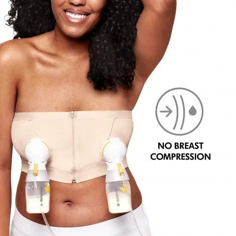 Medela Hands Free Pumping Bustier Chai beige worn by mom, dual pumps and bottles enable hands-free pumping.