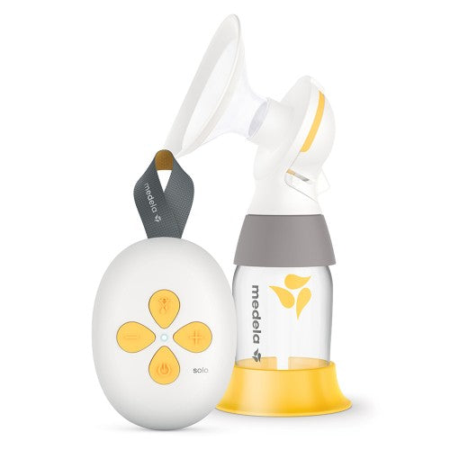 Medela Solo electric breast pump with white and yellow design and bottle/controller