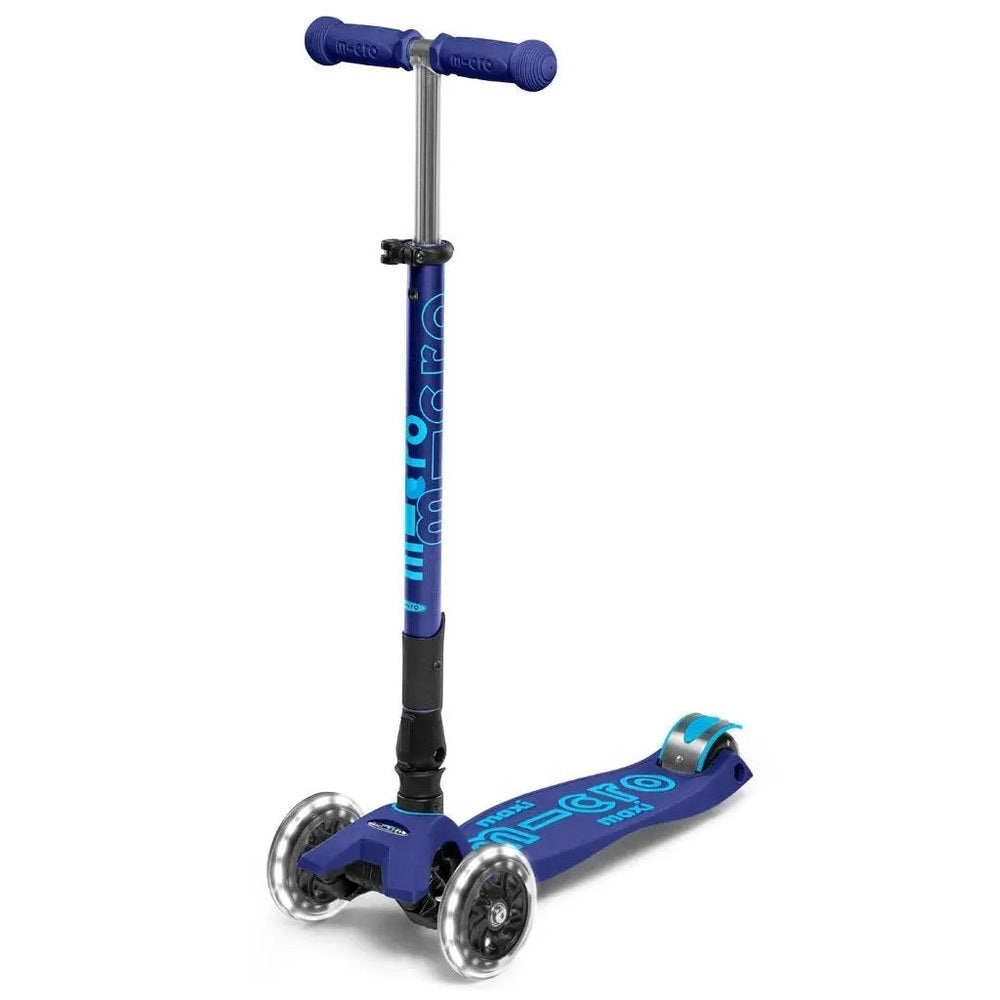 Micro Maxi Foldable Deluxe LED Scooter in blue with bright deck LEDs, extended T-bar and three wheels ready to ride.